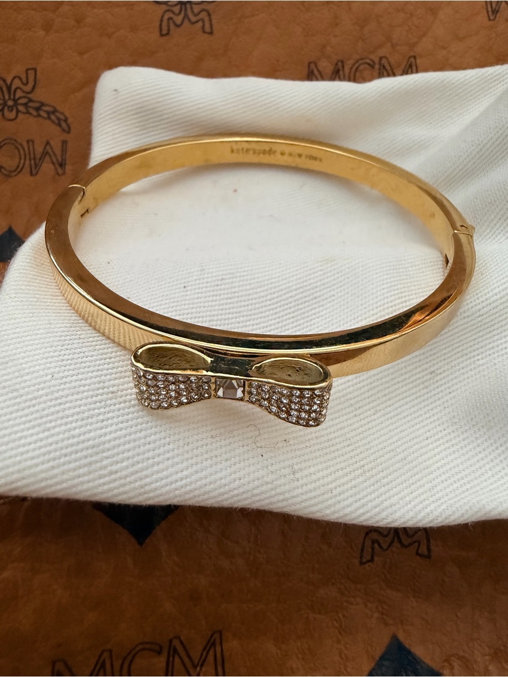 Kate Spade gold bow crystal bangle bracelet